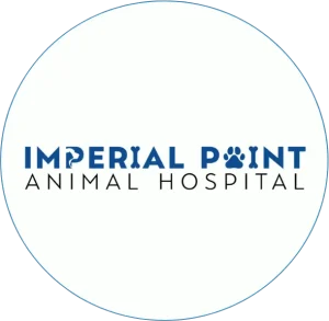Imperial Point Animal Hospital logo in blue text with a paw print motif between 'IMPERIAL' and 'POINT' on a white circular background.